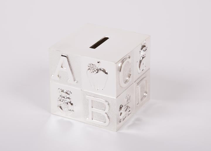 Silver-plated money box with ABC design. Can be personalised with engraving.