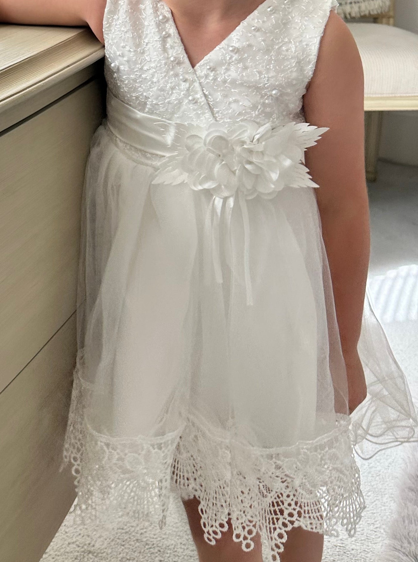 Ivory white lace flower girl dress intricate lace detail by Little Babybox.