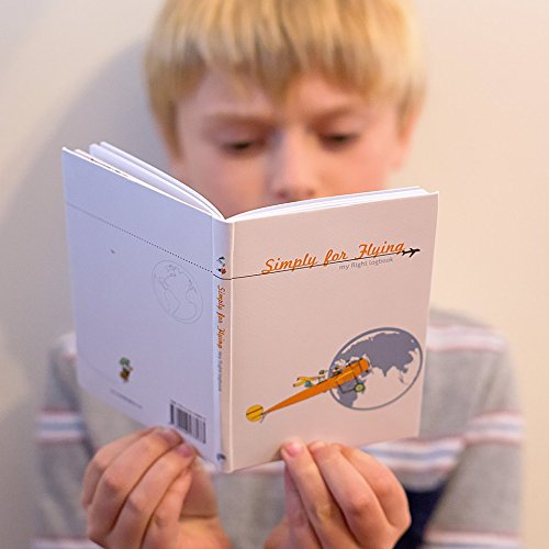 Child reading a book titled 'Simply for Flying' with airplane illustrations - Little Babybox