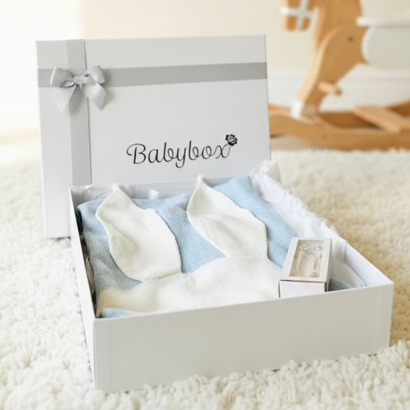 Luxury blue bunny baby hamper with knitted rabbit ears blanket and silver-plated teddy bear cutlery set by Little Babybox